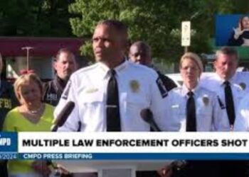 Charlotte community remembers officers in deadly shootings: ”I won’t apologize for my tears’