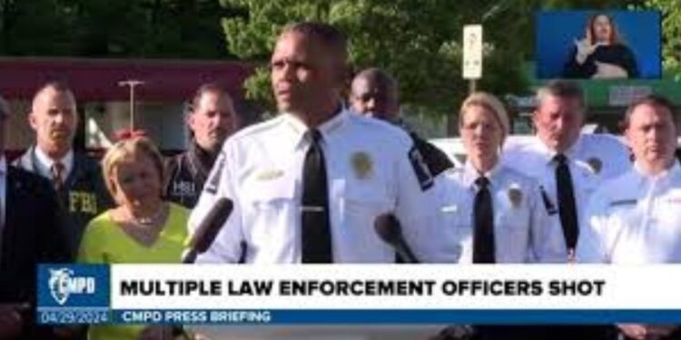 Charlotte community remembers officers in deadly shootings: ”I won’t apologize for my tears’