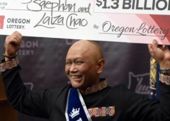 Immigrant from Laos battling cancer for eight years wins $1.3bn Powerball jackpot