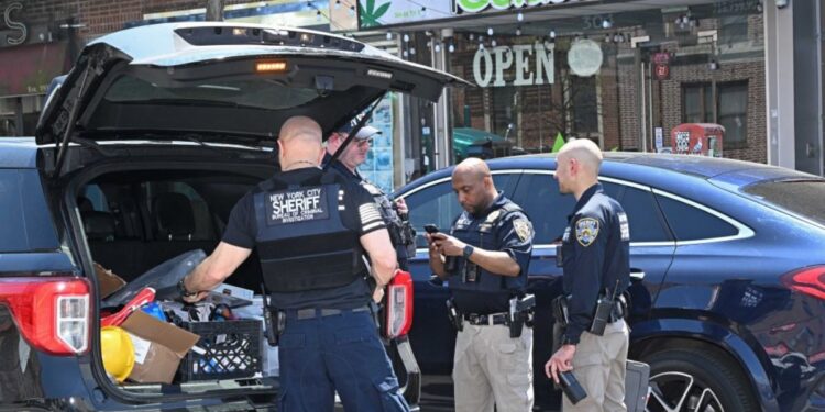 New York City police raid illegal marijuana dispensary a day after employee challenged authorities to shut it down