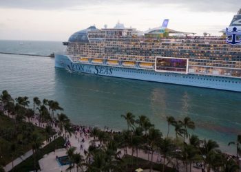 A passenger died after jumping from the world’s largest cruise ship as it set sail from Florida