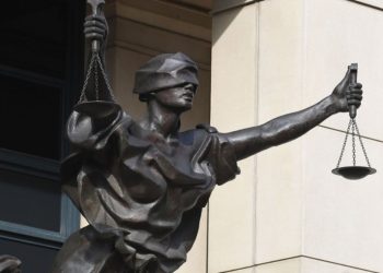 A jury has convicted an ex-Northeastern University employee who perpetrated a bomb hoax