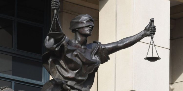 A jury has convicted an ex-Northeastern University employee who perpetrated a bomb hoax