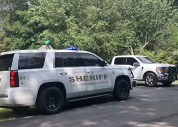 Four people died in a’murder-suicide’ when bodies were discovered laying on the driveway of a Georgia home